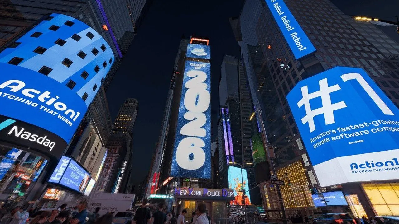 Action1 billboards displaying “#1” and “Patching That Just Works” in Times Square at night