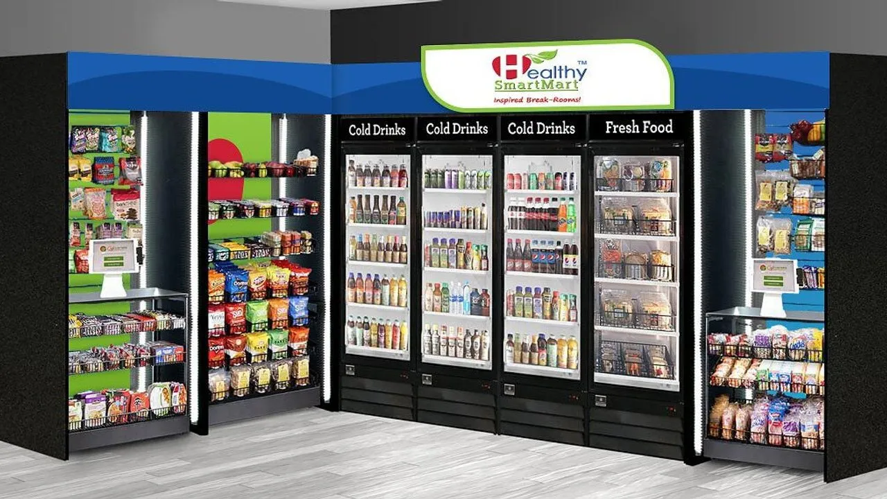 A Healthy Smart Mart break-room micro-market with refrigerated drinks, fresh food, snack shelves and self-checkout kiosks.
